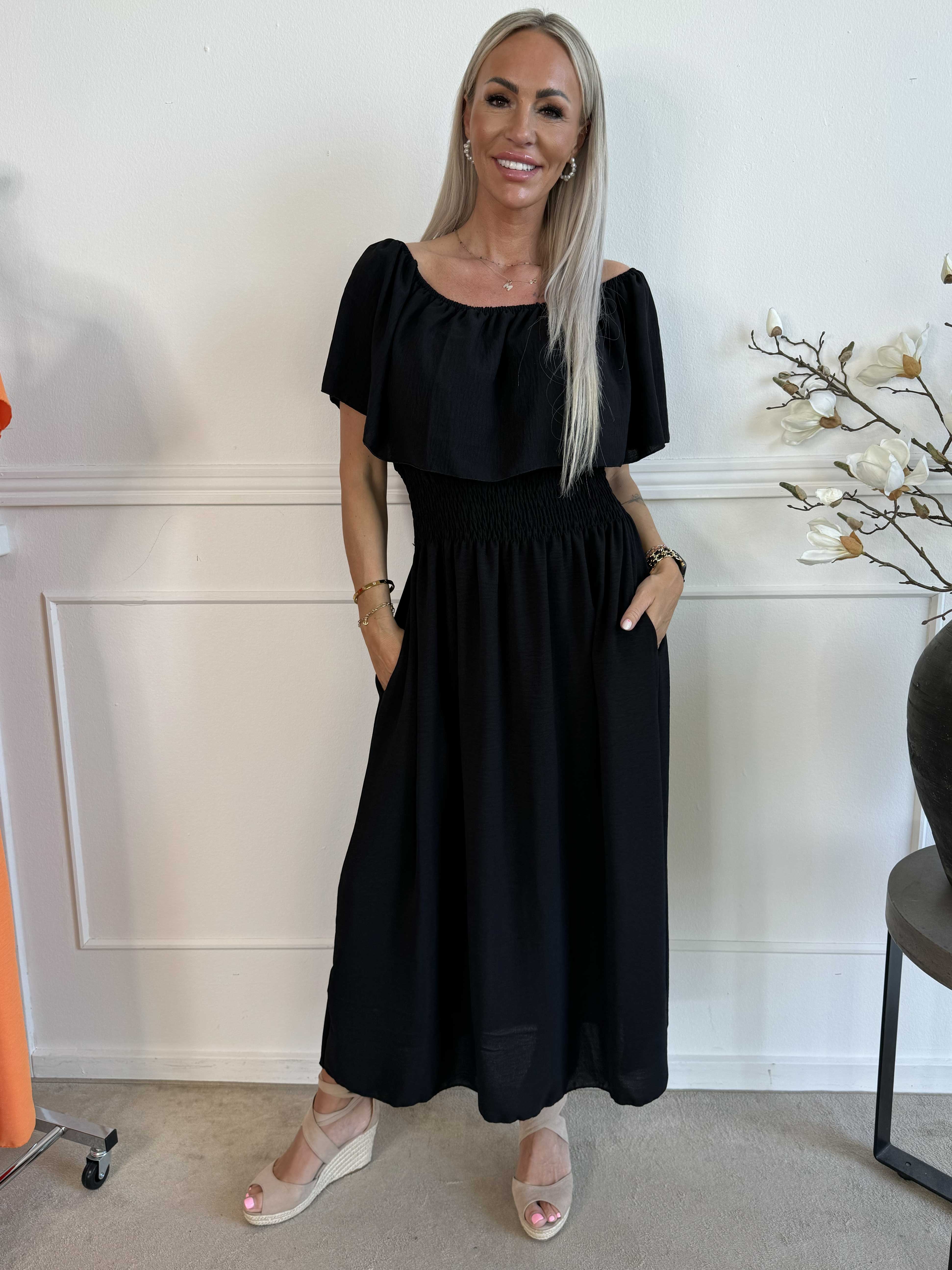 Rachel - Lang kjole med lommer og flæsekant